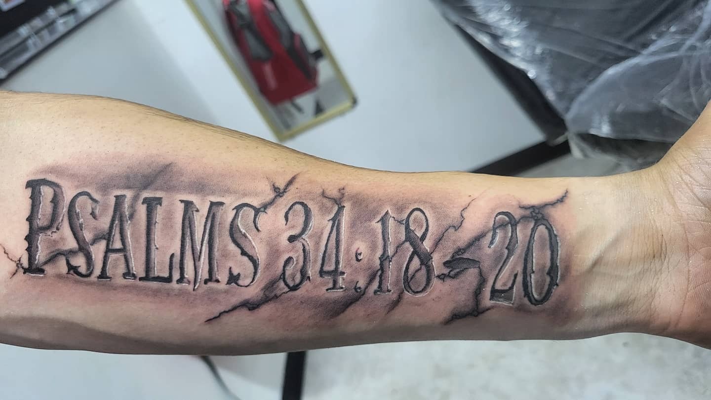 Romans 8:18 Forearm Tattoo with Three Crosses Tattoo Design
