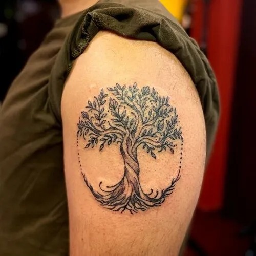 This upper arm tattoo offers a simple yet impactful design.