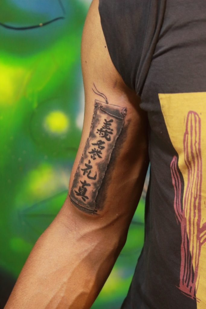 Scroll with Calligraphy Tattoo Design
