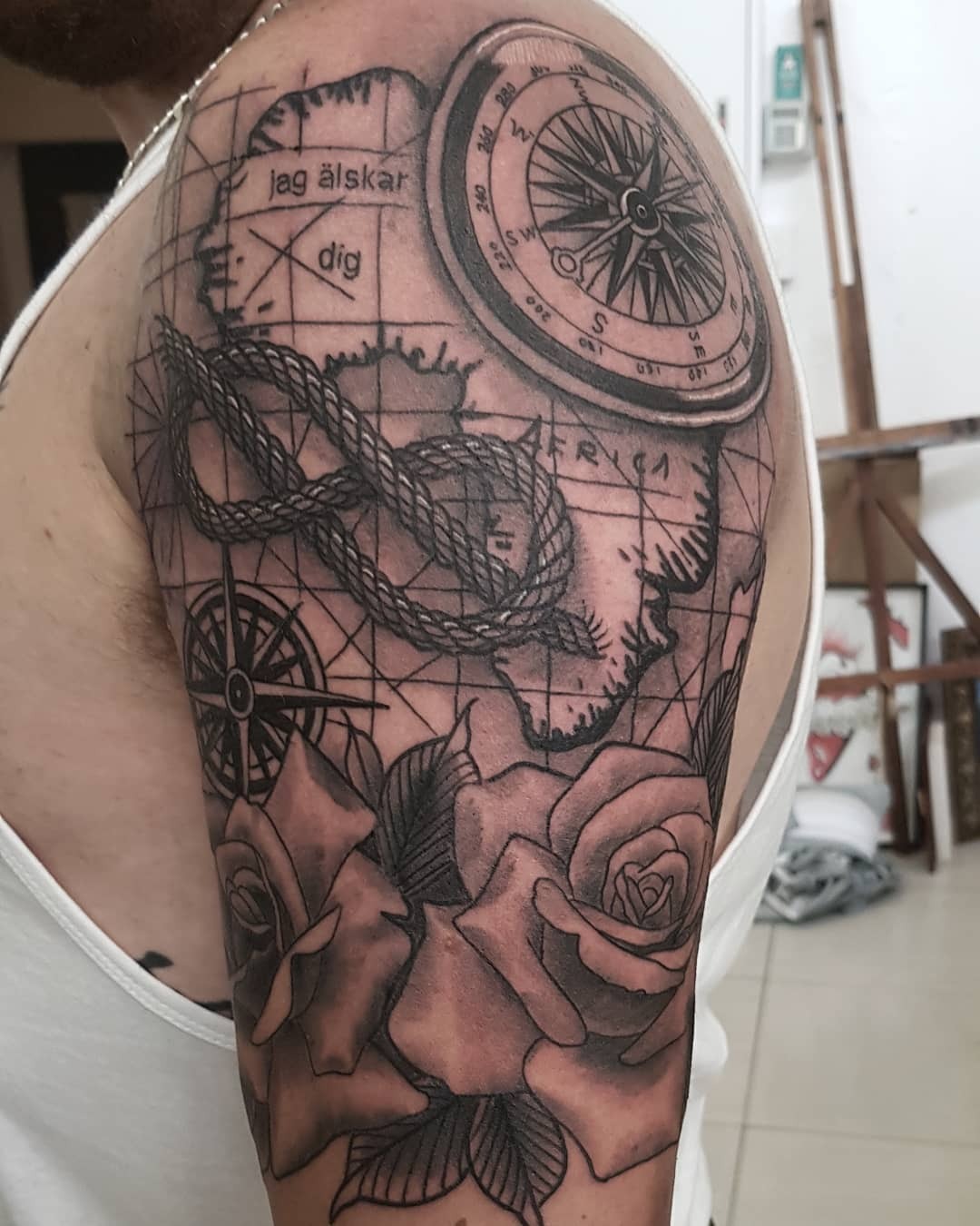 Compass and World Map Half Sleeve Tattoo Tattoo Design