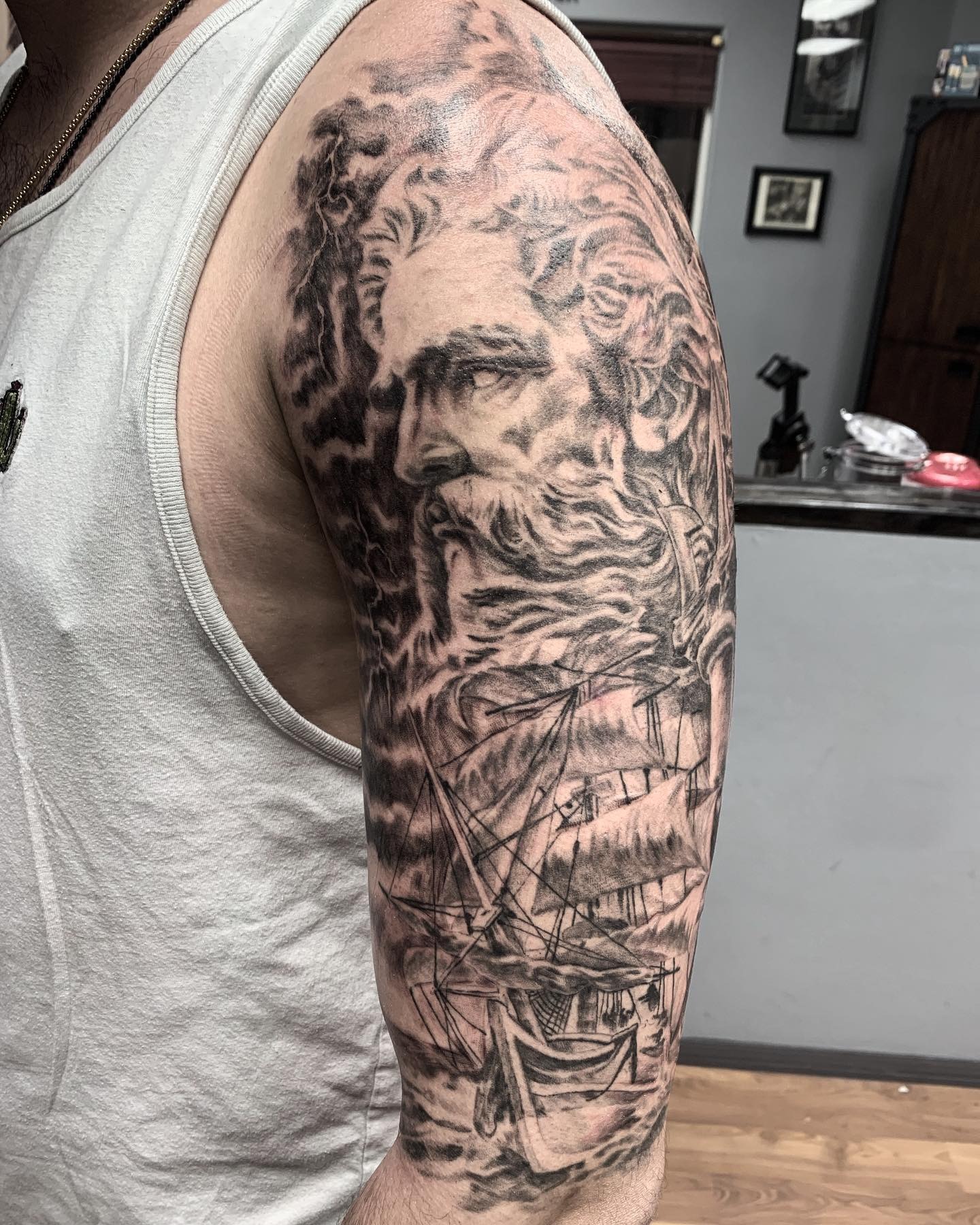 Poseidon and Sailing Ship Half Sleeve Tattoo Tattoo Design