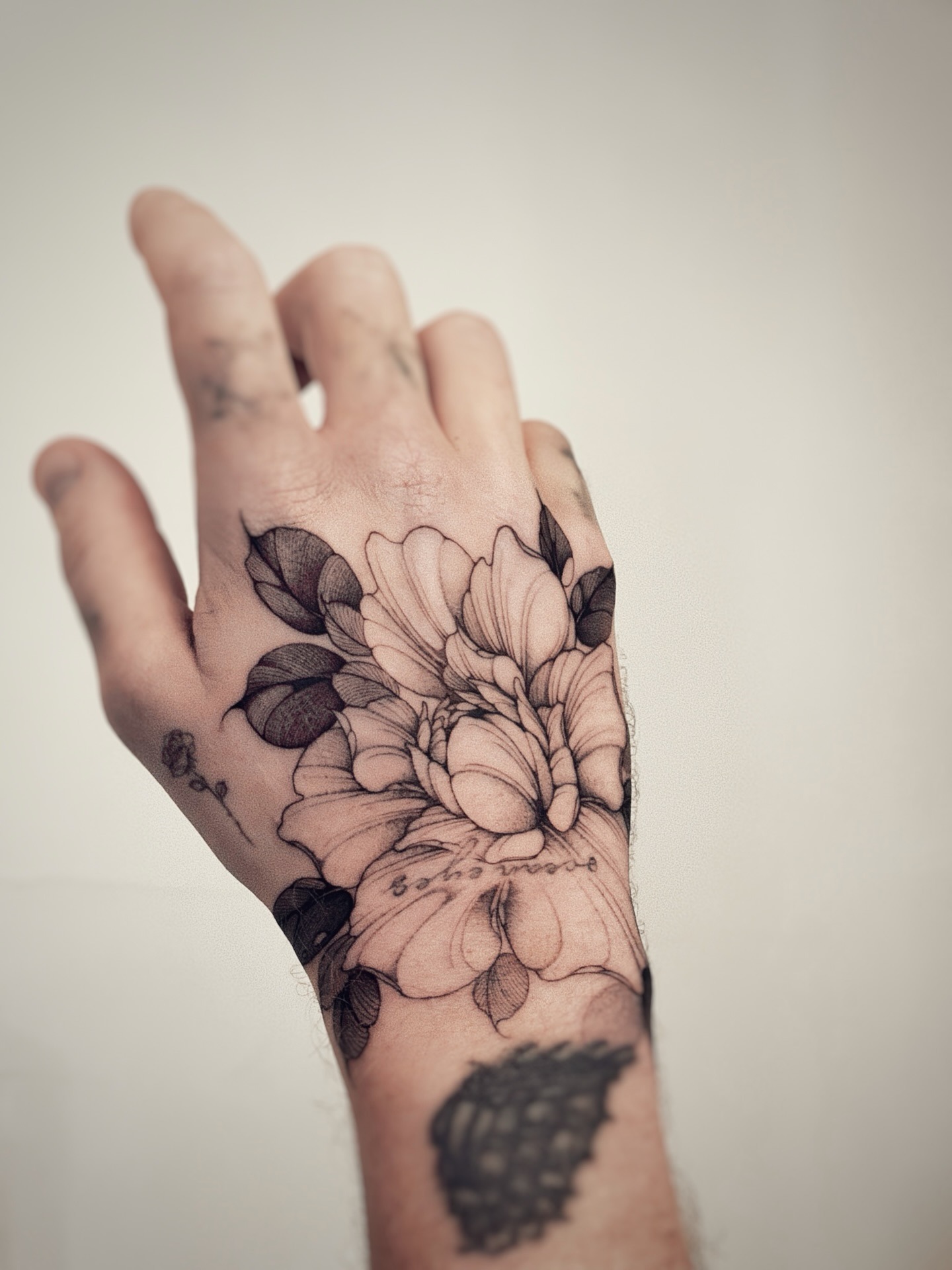 Peony Flower Hand Tattoo Tattoo Design