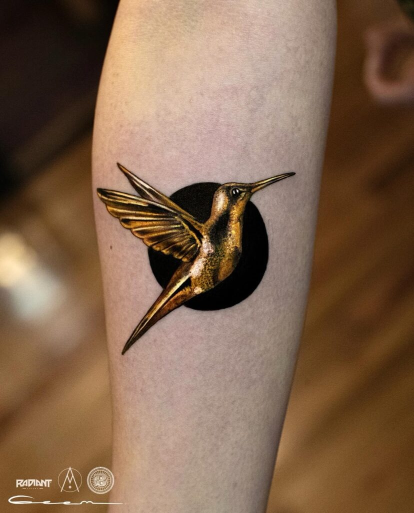 Bold Geometric Hummingbird with Sun Halo Tattoo Design