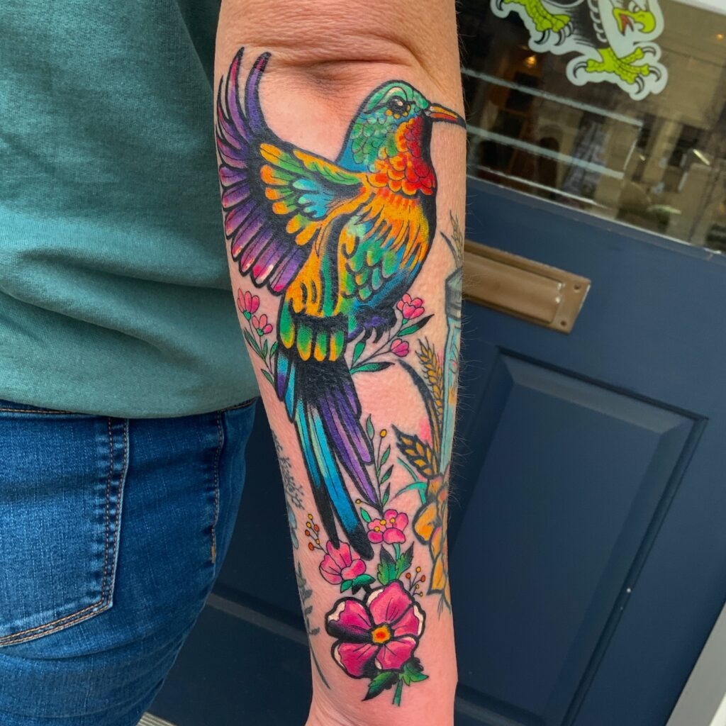 Bold Hummingbird with Skull and Flames Tattoo Tattoo Design