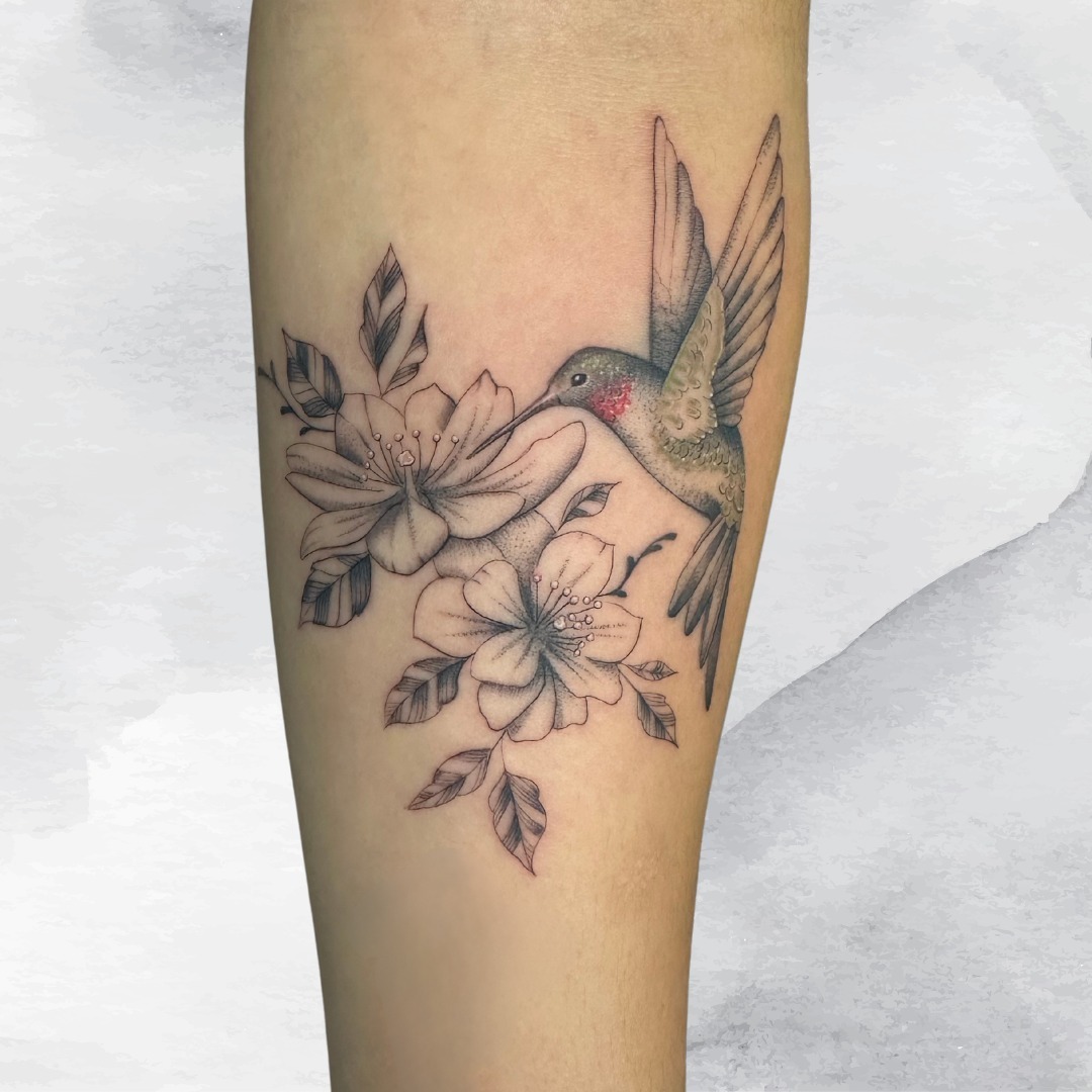 Colorful Hummingbird with Forget-Me-Nots and Lily of the Valley Tattoo Design