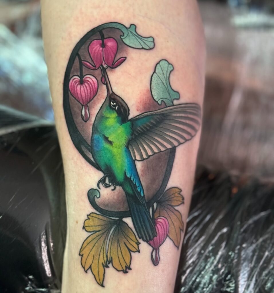 Hummingbird in Flight with Blooming Flowers Tattoo Design
