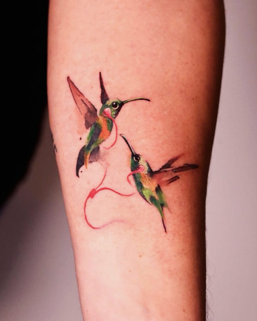 Watercolor Hummingbird with Botanical Accent Tattoo Design