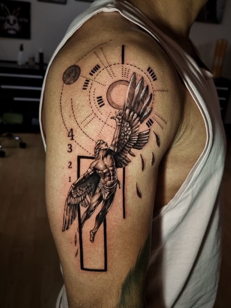 Burning Wings of Icarus on the Shoulder Blade Tattoo Design