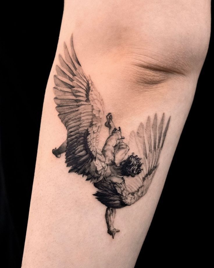 Winged Guardian with Classical Strength Tattoo Design