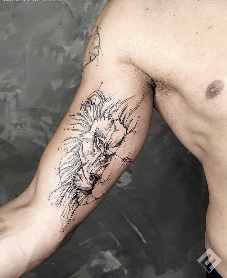 Abstract Lion Inner Bicep Tattoo Tattoo Design
