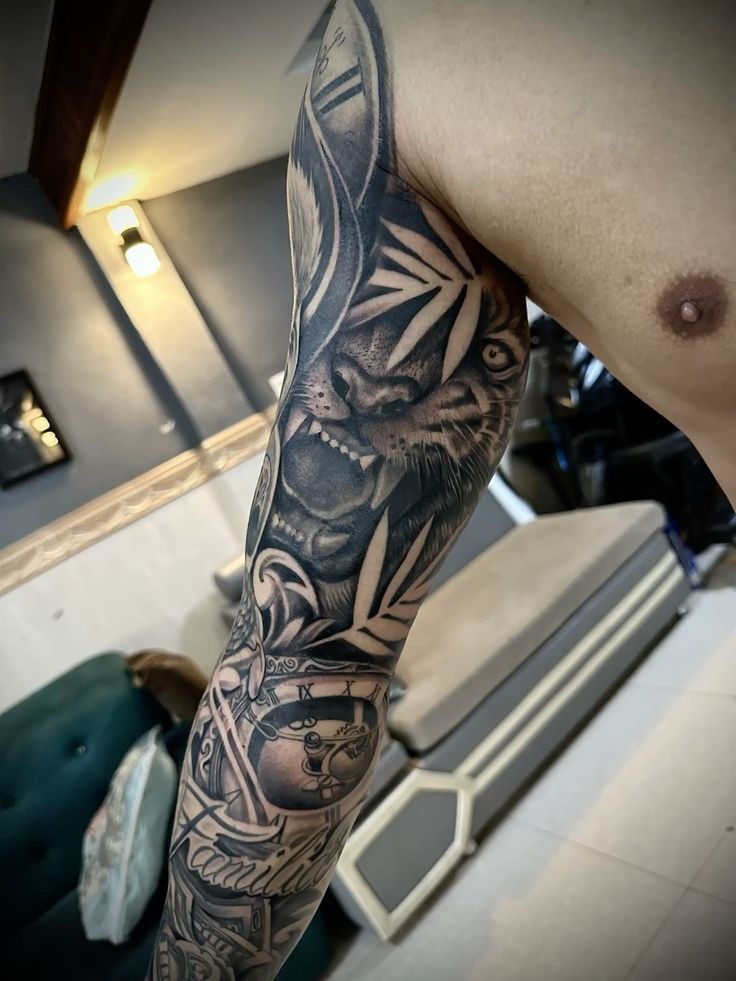 Tiger and Clock Sleeve-Style Inner Bicep Tattoo Tattoo Design