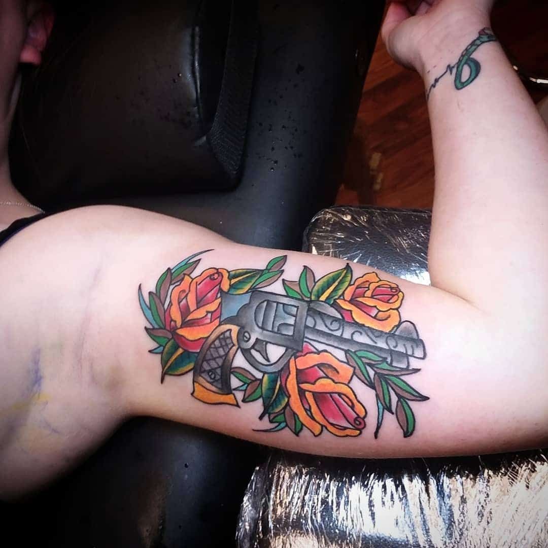 Traditional Revolver and Rose Inner Bicep Tattoo Tattoo Design