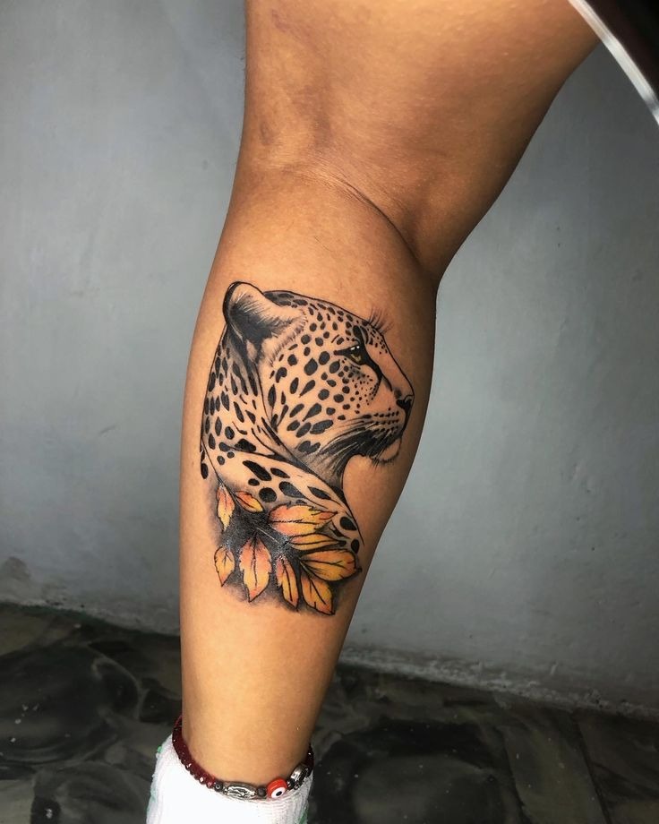 Delicate Jaguar With Floral Accents Tattoo Design