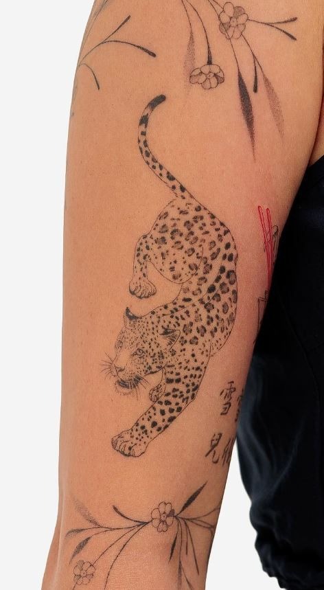 Dynamic Jaguar In Motion Tattoo Design