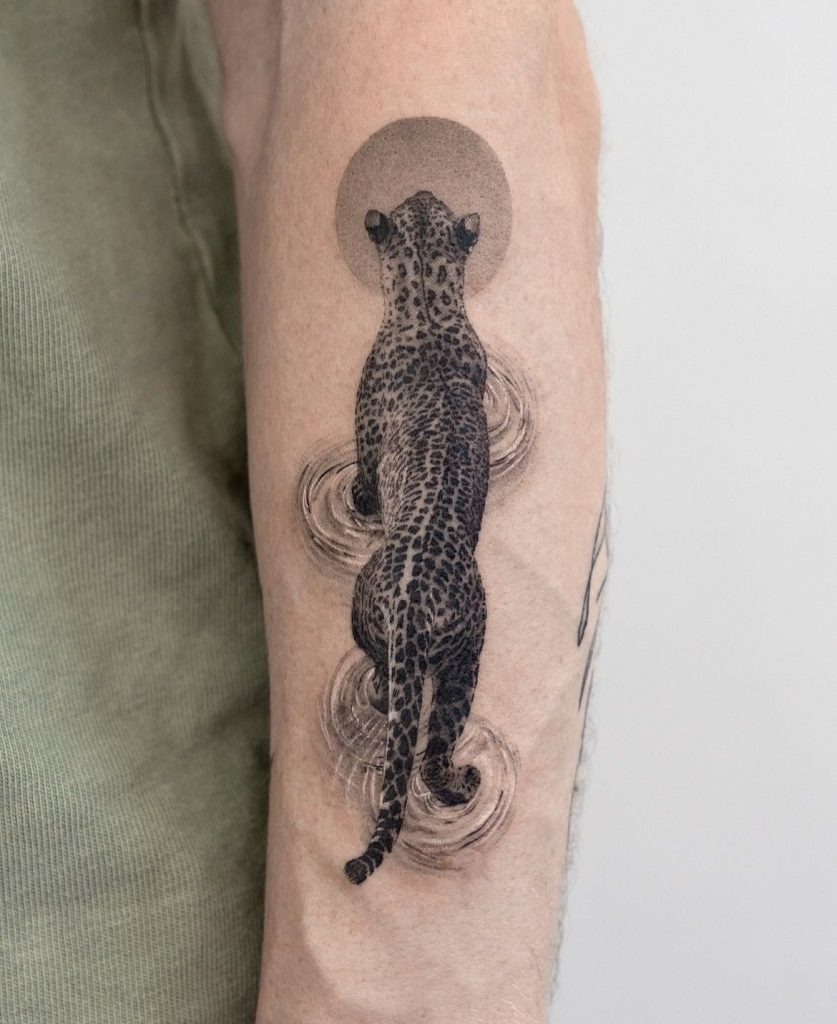 Prowling Jaguar Along The Thigh Tattoo Design