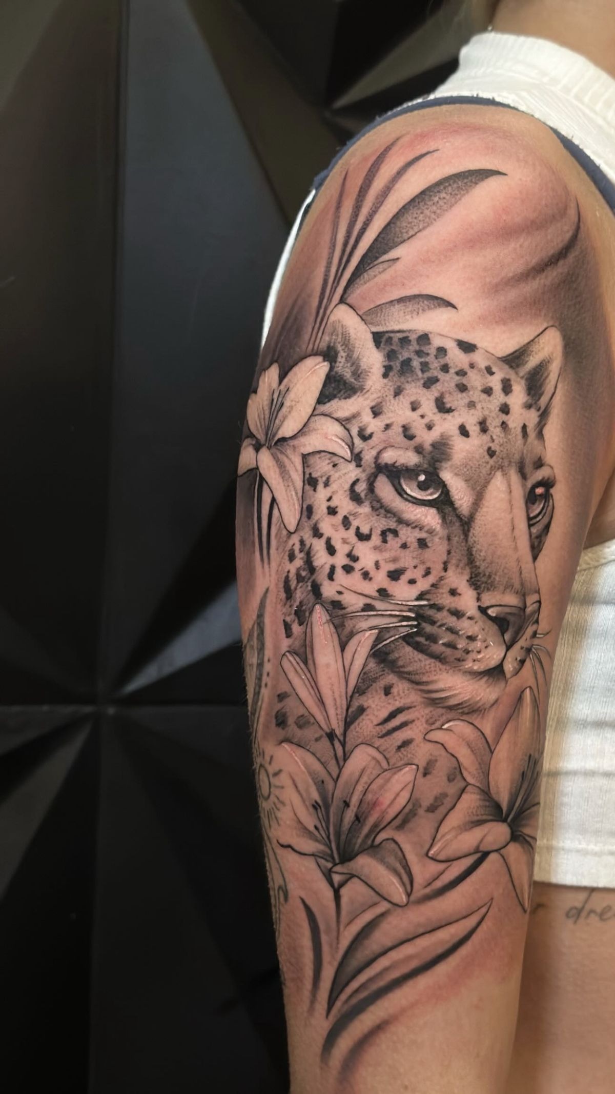 Scattered Jaguar Spots Across The Shoulder Tattoo Design
