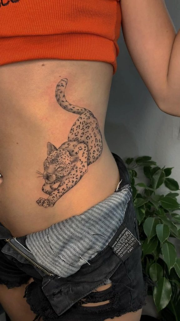 Side-Crawling Jaguar Along The Ribs Tattoo Design