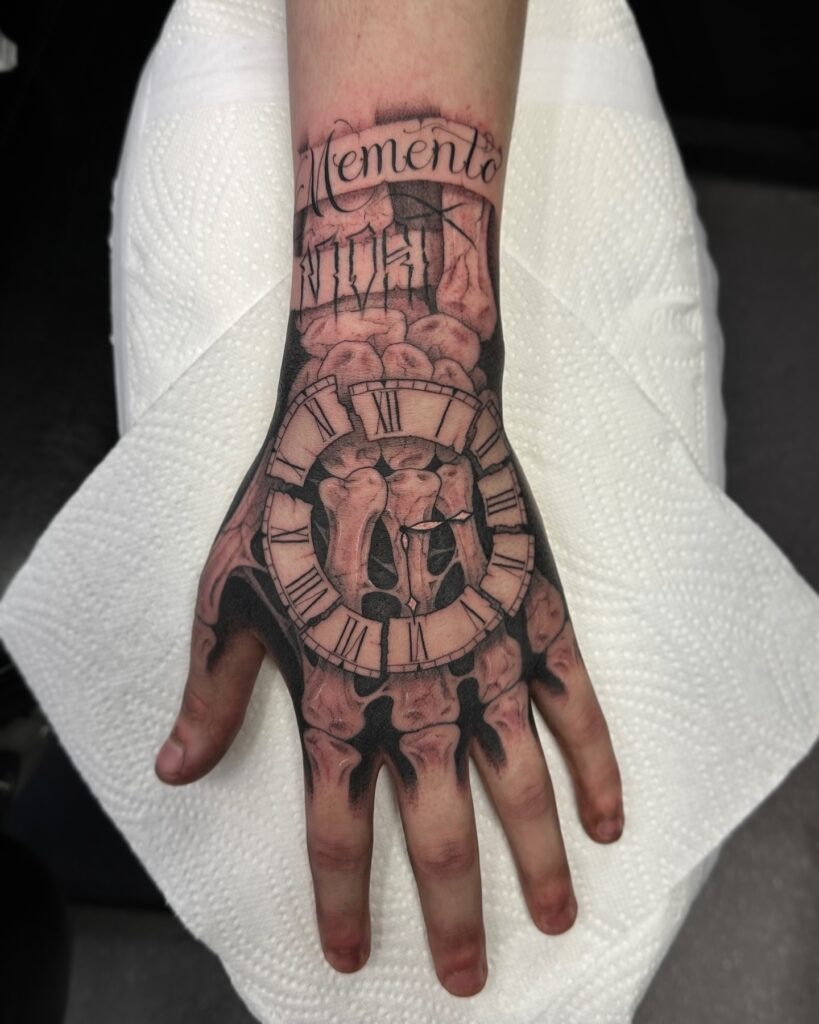 Memento Mori Clock and Bone Hand Tattoo Tattoo Design