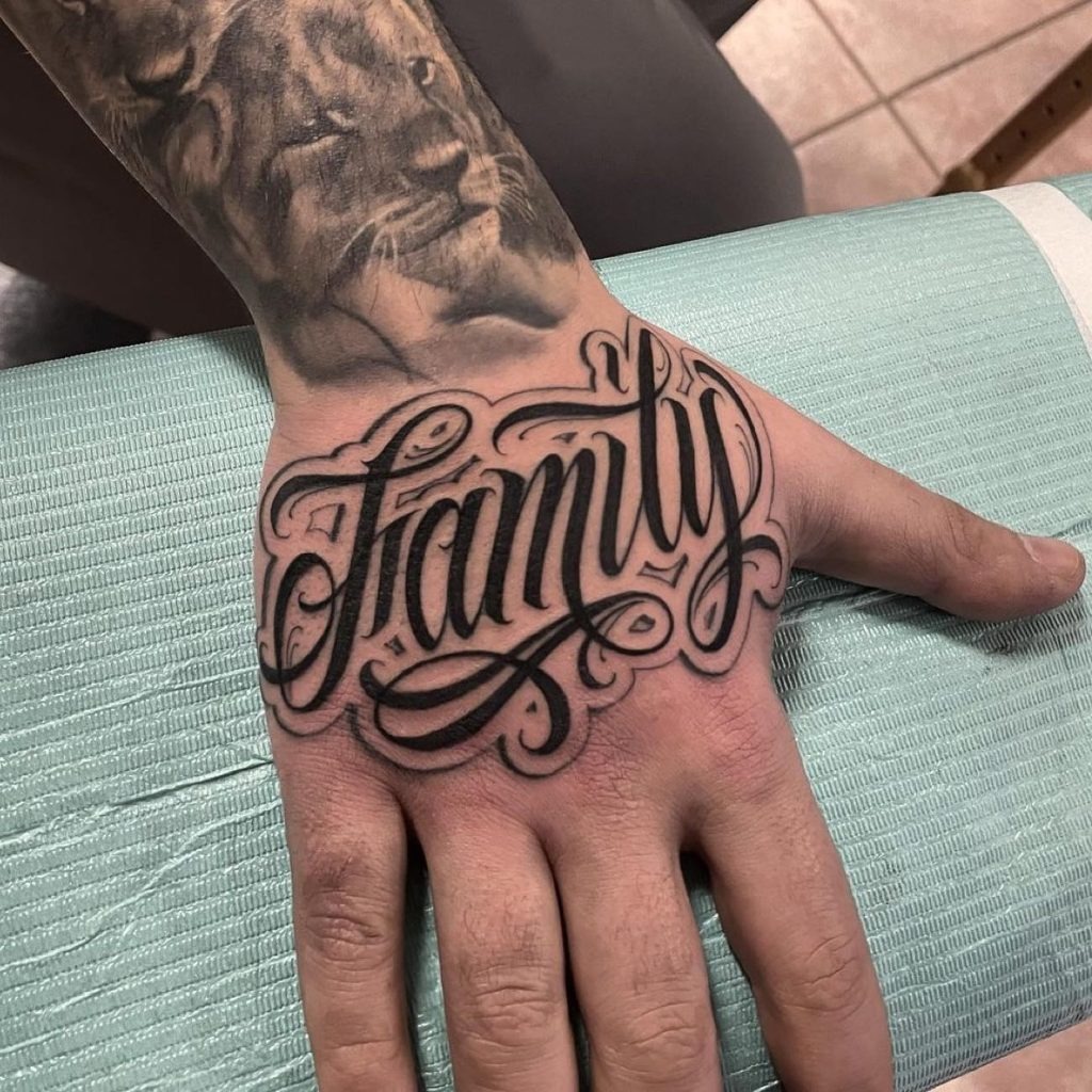 Bold Arm Script Tattoo Design