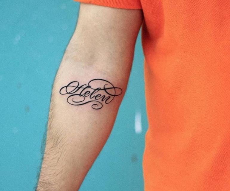 Elegant Script on Inner Arm Tattoo Design