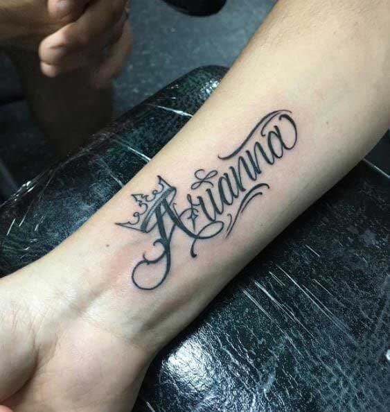 Forearm Script with Crown Tattoo Design