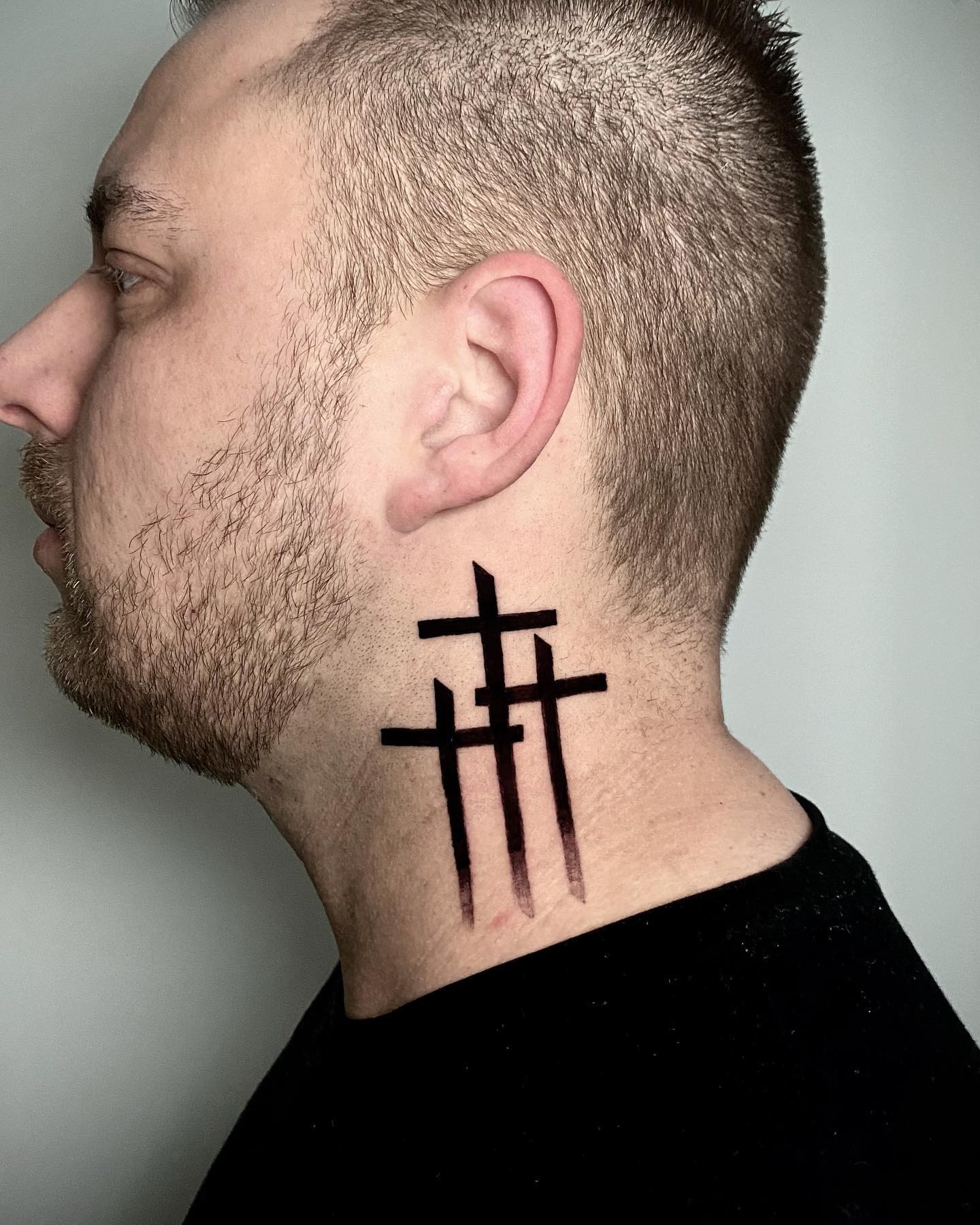 Bold Three Crosses Neck Tattoo with Gradient Shadow Tattoo Design