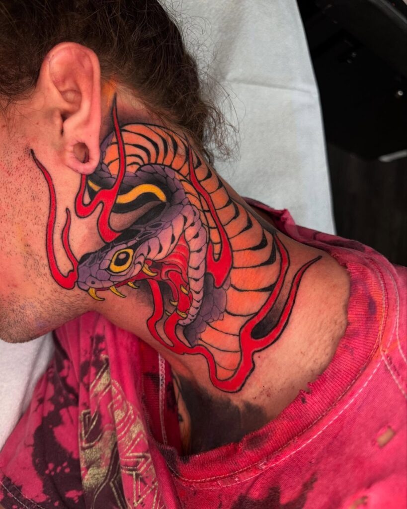Bold ‘WANTED’ Neck Tattoo with Stencil Style Tattoo Design