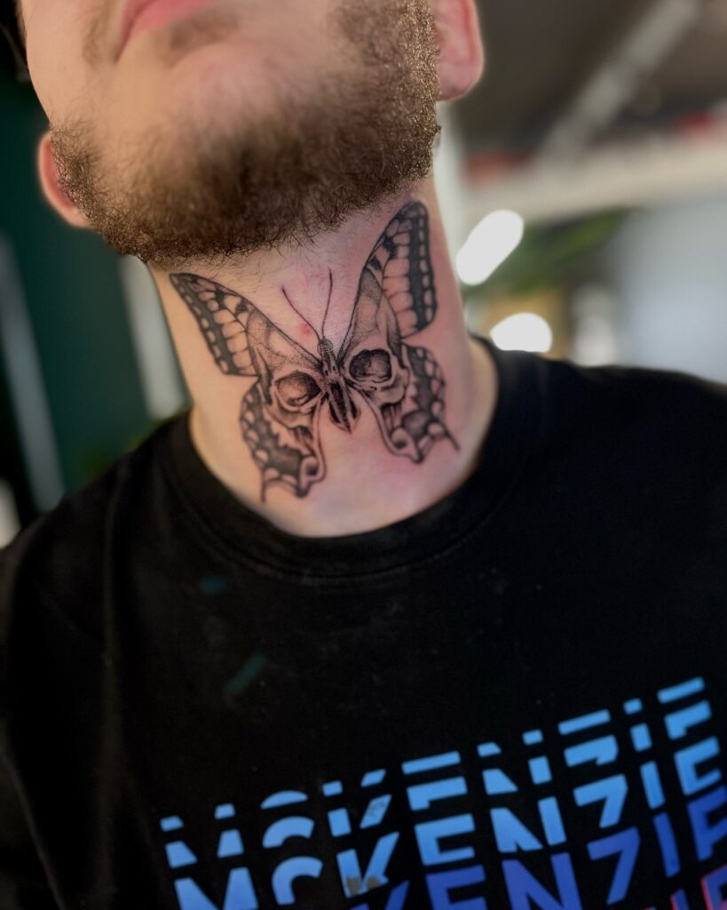 Mandala Dotwork Neck Tattoo with Bold Symmetry Tattoo Design