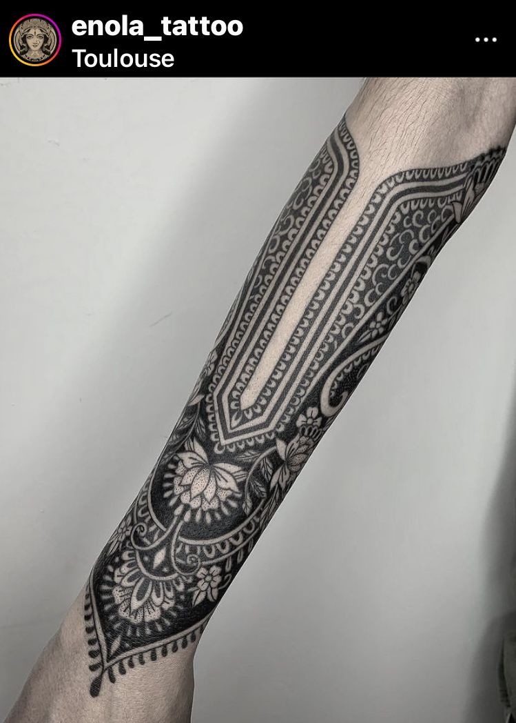 Bold Floral Sleeve with Traditional Elements Tattoo Design