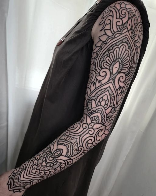 Cosmic Neo-Traditional Sleeve Tattoo Design