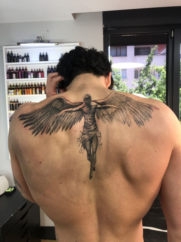 Angel Wings Across the Upper Back Tattoo Design