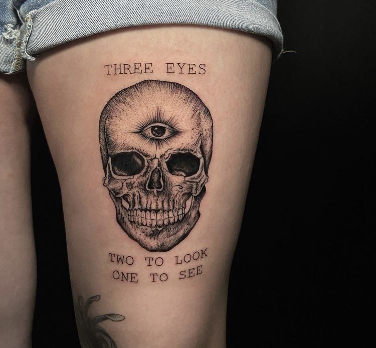 Third Eye Skull Inscription, a tattoo design rendered in clean detailed linework.