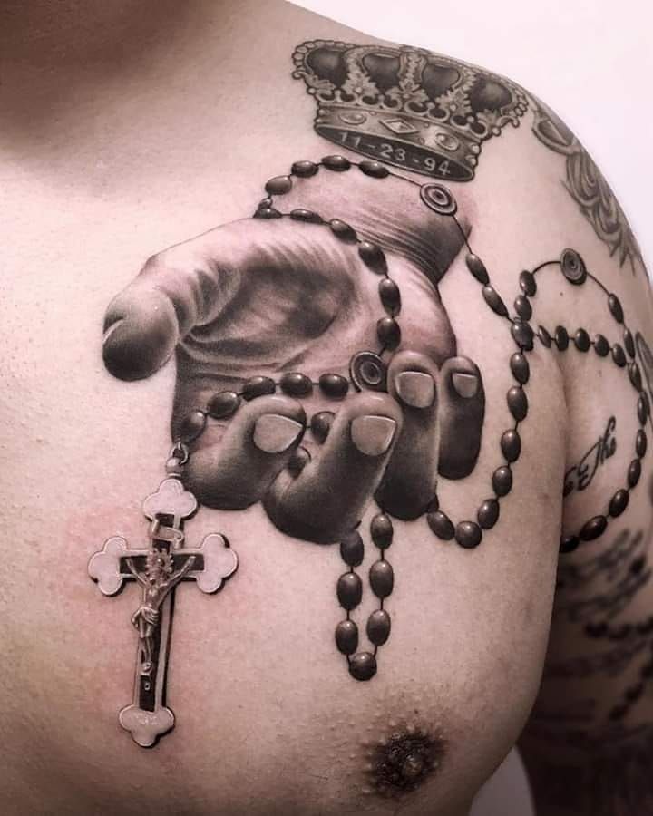 Hyper-Realistic Rosary in Hand Tattoo Tattoo Design