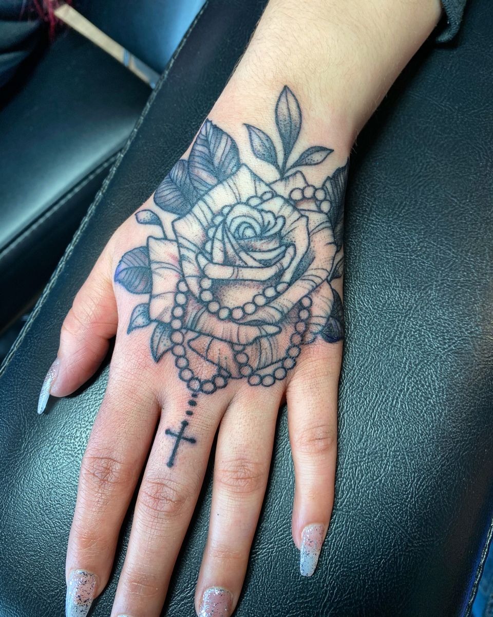 Rose and Rosary Hand Tattoo Tattoo Design