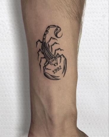 Minimalist Scorpion with Birth Year Tattoo Design