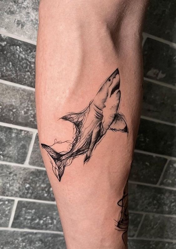 Dynamic Minimalist Shark in Motion Tattoo Design