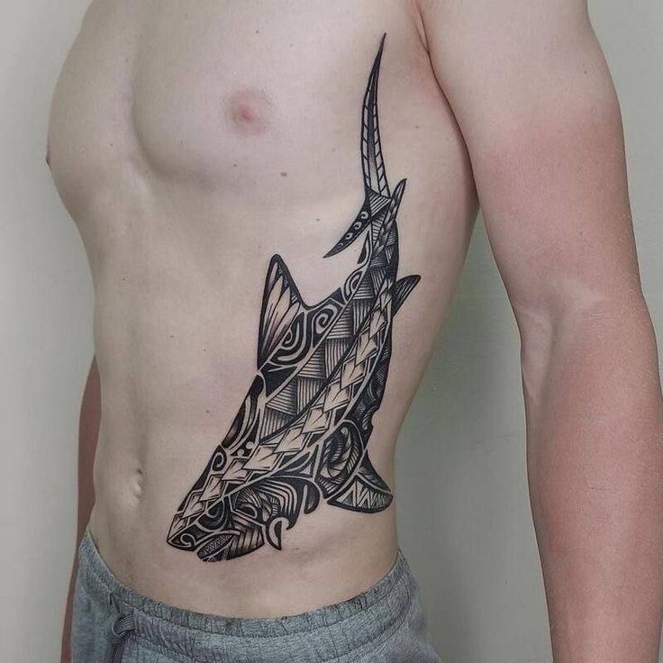 Tribal Elegance on the Ribs Tattoo Design