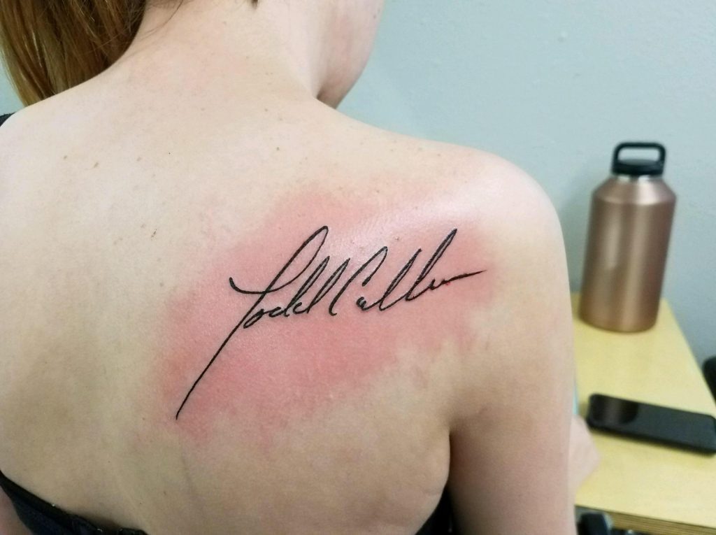 A Bold Tribute on the Shoulder Tattoo Design