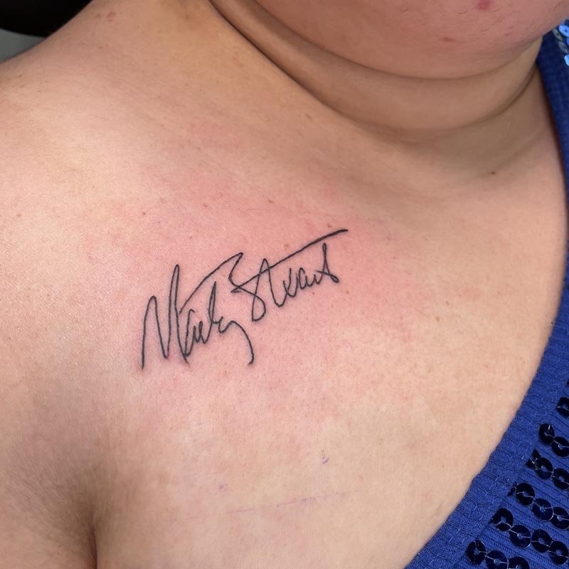 A Delicate Tribute on the Chest Tattoo Design