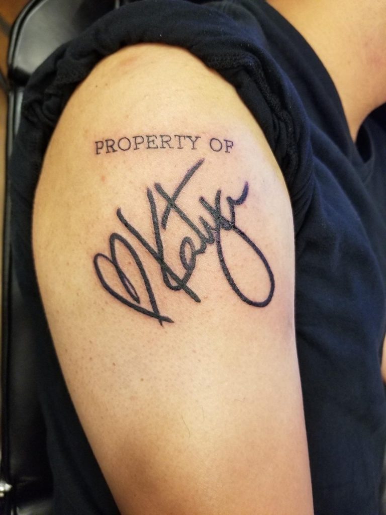 A Statement of Ownership and Love Tattoo Design