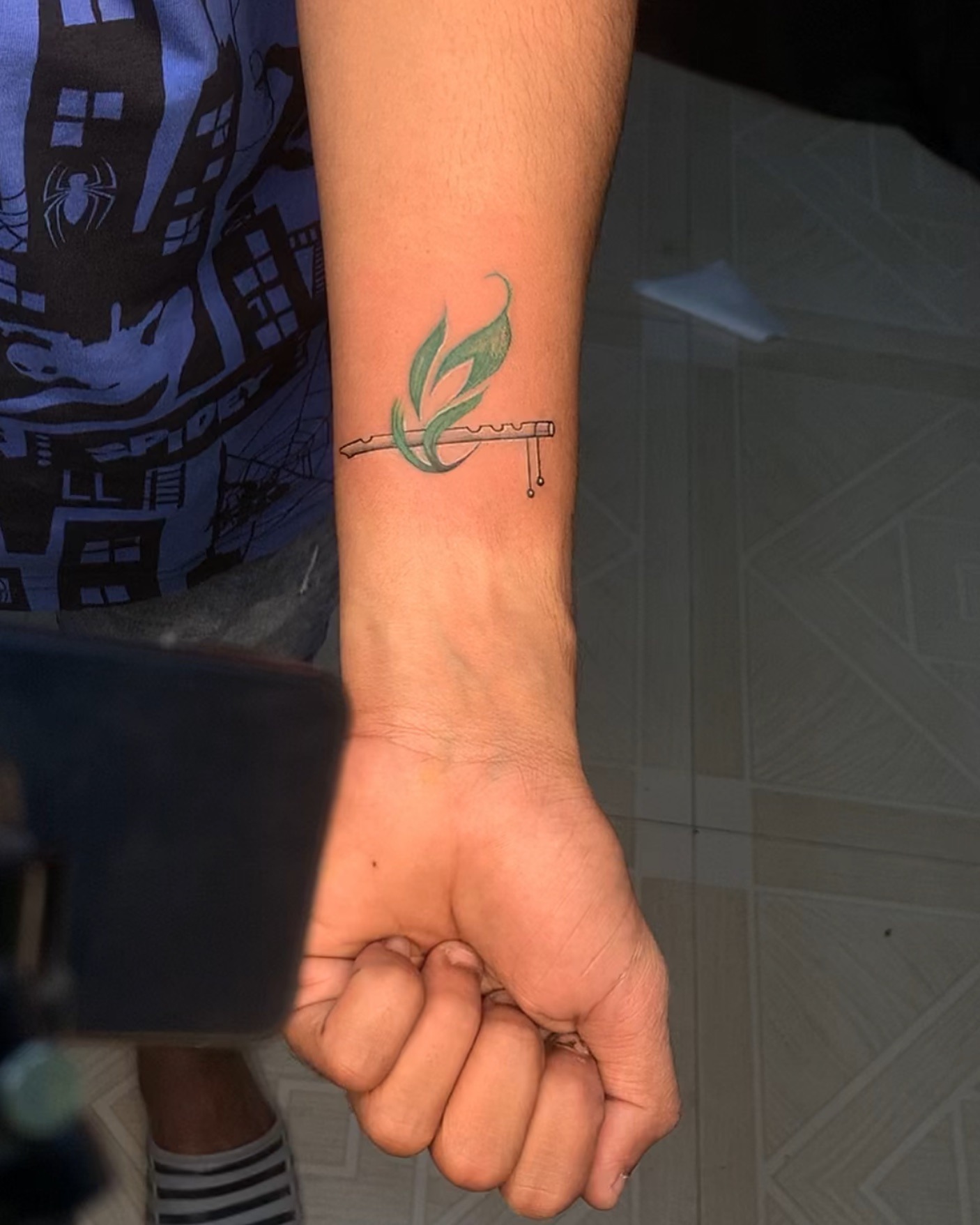 Flute and Green Leaf Tattoo Tattoo Design