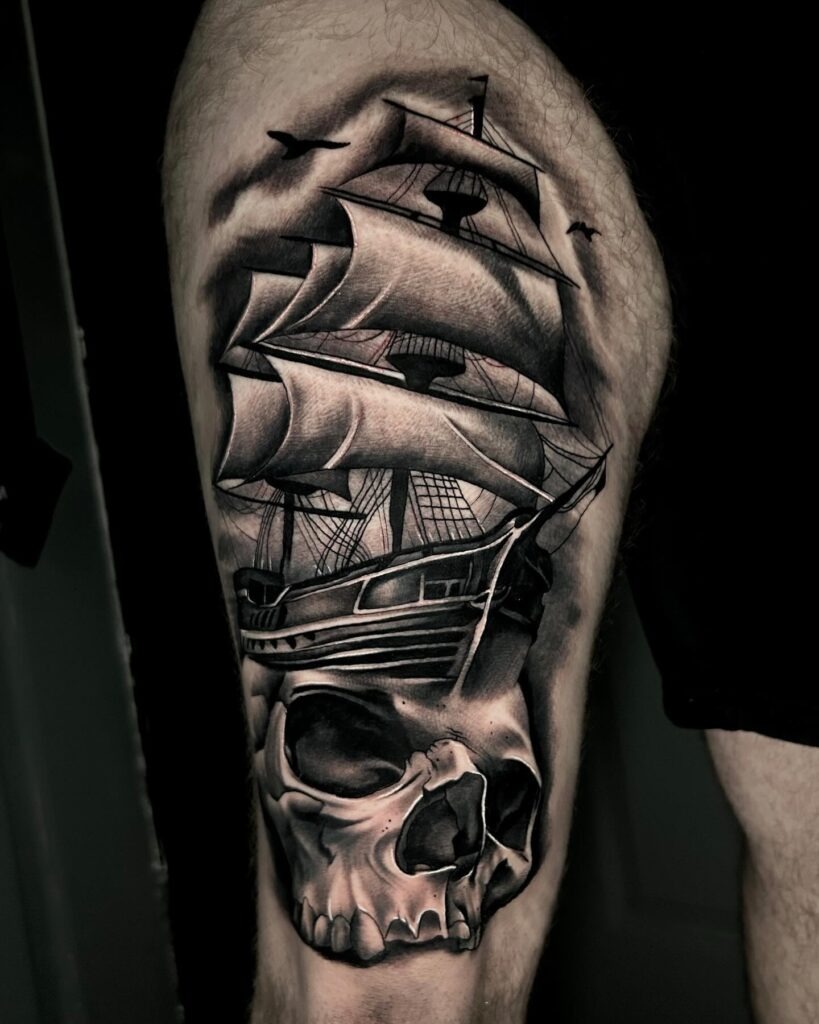 Ghostly Ship and Skull Thigh Tattoo Tattoo Design