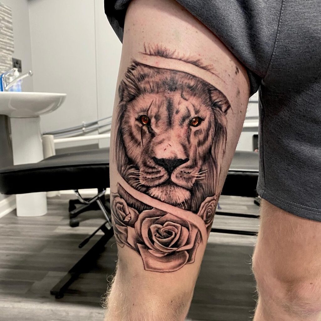 Lion and Roses Thigh Tattoo Tattoo Design