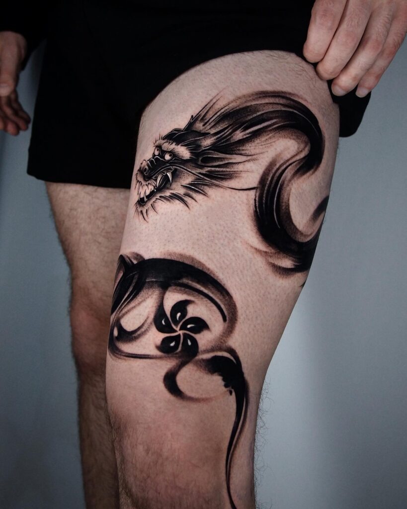 Surreal Hand and Compass Thigh Tattoo Tattoo Design