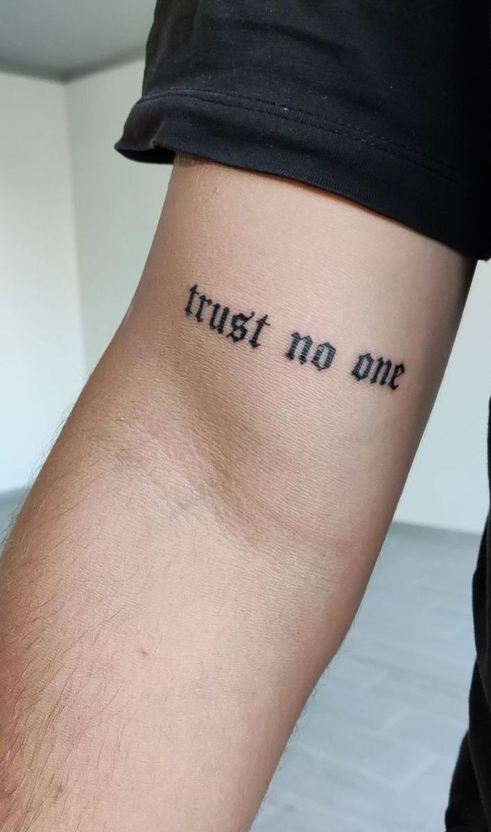 Elegant Script Trust No One Tattoo Tattoo Design