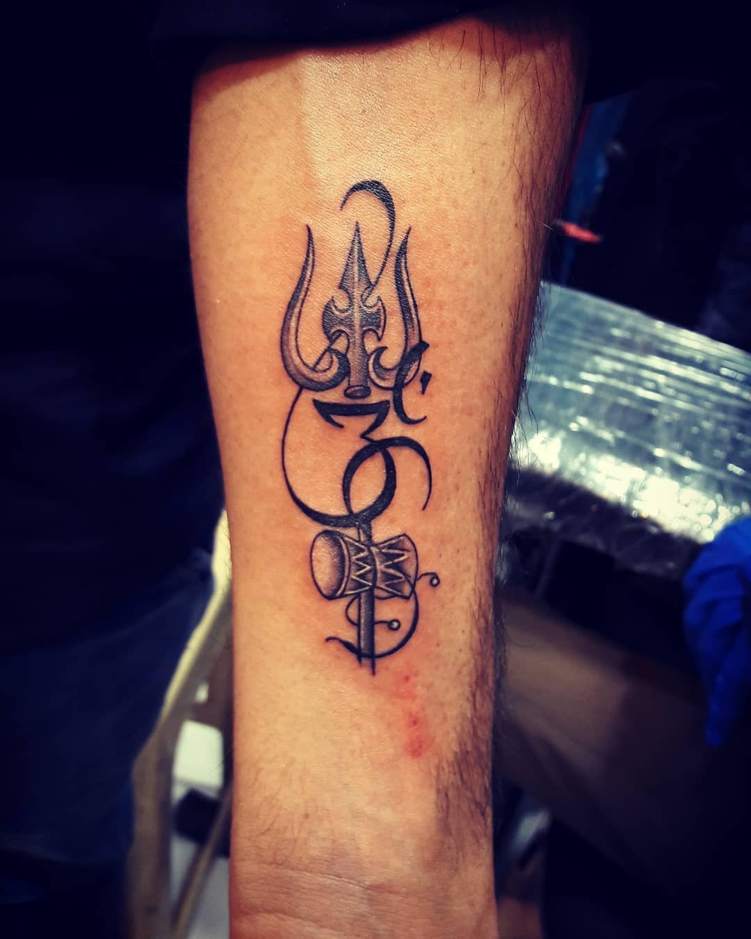 Trident and Drum Wrist Tattoo Tattoo Design