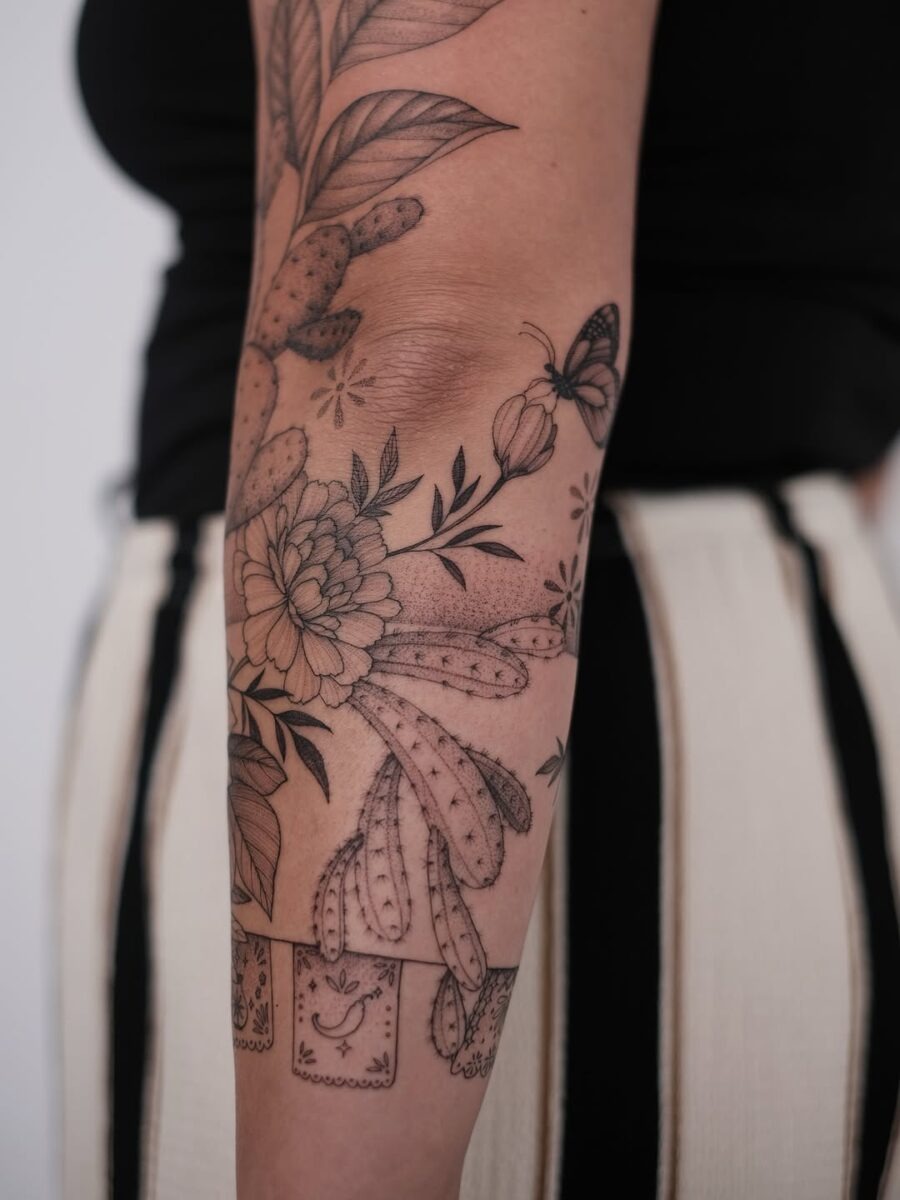 Elegant cactus and floral tattoo design Tattoo Design
