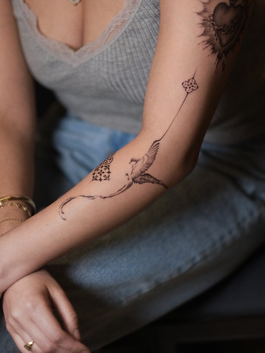 Elegant Mexican-inspired tattoo on the arm Tattoo Design