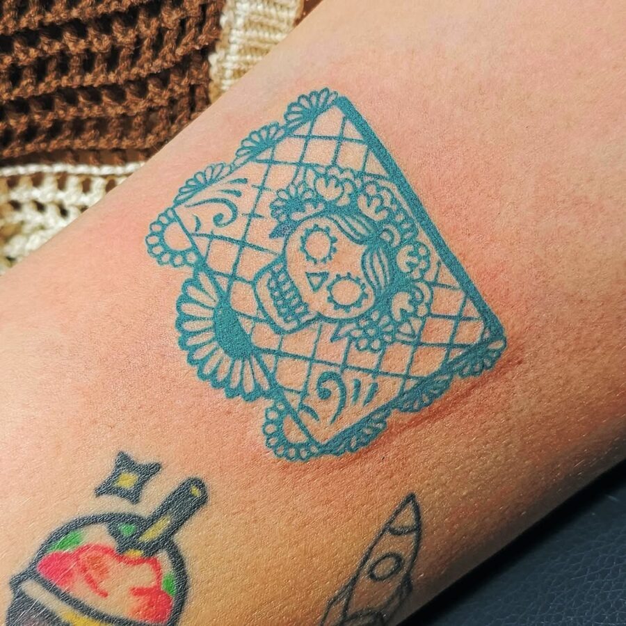 Intricate sugar skull tattoo with lace details Tattoo Design