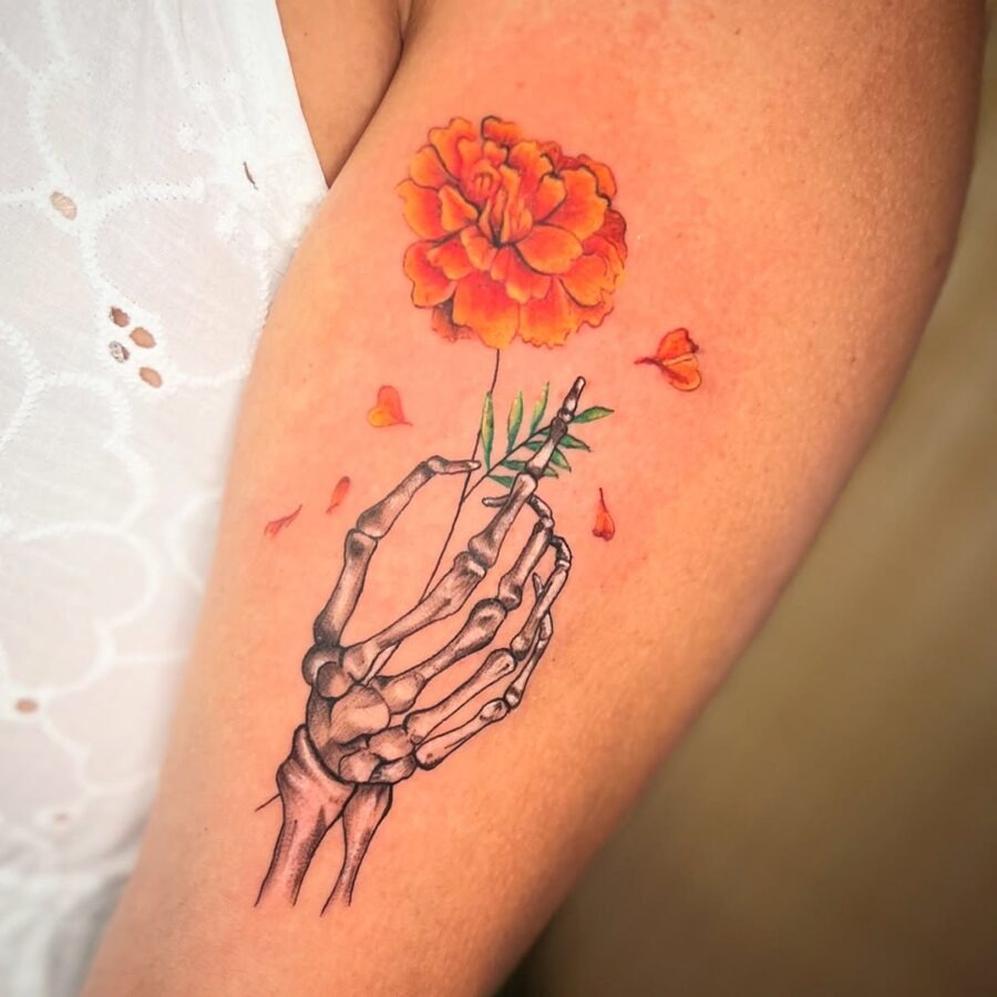 Unique skeleton hand bouquet tattoo design Tattoo Design